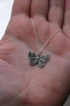 Copy and paste into your browser, get 15% off ➔ https://bit.ly/VD15OFF Crafted from sterling silver, this butterfly necklace is the perfect accessory for any outfit. The delicate design adds a touch of elegance, while the quality material ensures long-lasting beauty. Enhance your style with this timeless piece and stand out from the crowd. DETAILS: -One necklace -Approximately 24mm x 21mm Sterling Silver Charm -Sterling Silver chain in the length of your choice -Spring ring clasp You will receiv Butterfly Charm Jewelry For Birthday, Butterfly Charm Jewelry Gift, Silver Butterfly Jewelry For Mother's Day, Butterfly Necklace For Birthday And Mother's Day, Mother's Day Silver Butterfly Jewelry, Butterfly Charm Round Pendant Jewelry Gift, Butterfly Shaped Sterling Silver Jewelry Gift, Butterfly Shaped Sterling Silver Jewelry For Gifts, Butterfly Charm Jewelry For Mother's Day Birthday Gift