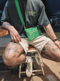 Perfect small crossbody green travel bag, daily essentials, sitting on a chair near the beach, oversized tshirt, streetwear mens Men With Bags Outfit, Mens Cross Body Bag Street Style, Man Cross Body Bag, Green Casual Bags With Anti-theft Pocket, Casual Green Chest Bag For Everyday Use, Casual Green Belt Bag, Everyday Green Chest Bag With Cell Phone Pocket, Urban Everyday Crossbody Chest Bag, Everyday Urban Crossbody Chest Bag