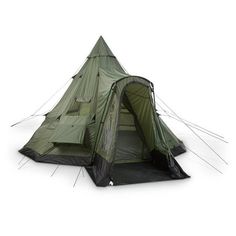 a green tent sitting on top of a white floor