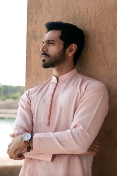 Introducing our light pink colored men's kurta, a majestic and exceptionally designed ensemble that is sure to turn heads. This kurta features stunning details of dori embroidered panel and motifs for daman, adding a touch of traditional charm to the overall look. The light pink color gives a sense of freshness and is perfect for summer occasions. The kurta is paired with a plain trouser, making it an ideal choice for any summer event. With its impeccable craftsmanship and attention to detail, this kurta is a must-have for any fashion-forward man looking to add a touch of sophistication to his wardrobe. Invest in this stunning light pink colored men's kurta and make a statement at any occasion. Regal Rose, Men's Kurta, Light Pink Color, Summer Events, Men Looks, Pink Color, Light Pink, Fashion Forward, Sense