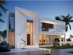 a white modern house with palm trees in the background at dusk, lit up by lights