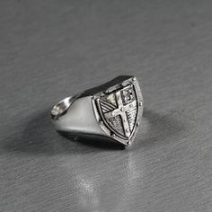 "SKU: k4550 \"Varangian Knight's Shield\" Features: Brand new sterling ring silver 925. Not plated, 100% solid silver metal! Approx weight of the product (Size 20mm)- 7.8 g.; Size of the top - 16x14 mm Processing: 1) Blackening by oxidation (More contrast black and white color) 2) Shine rhodium plated (Color looks like silver and it does not get dark in time) Availability of proprietary tag manufacturer - Yes; Manufacturing and country of origin - Ukraine; online shop - www.indigo.jewelry e-cata Timeless Silver Sterling Engraved Ring, Engraved White Gold Ring In Sterling Silver, White Gold Engraved Ring With Polished Sterling Silver, White Gold Engraved Ring With Polished Finish, Symbolic Silver Sterling Signet Ring, Classic Silver Ring Stamped 925, Timeless Silver Ring Stamped 925, Timeless Silver Ring, Sterling Silver Engraved Ring In White Gold