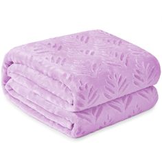 the purple blanket is folded on top of each other, with leaves drawn on it