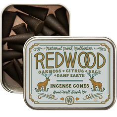 an open tin of redwood incense sticks