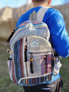 "Namaste Natural Hemp Fashionable Nepali Unisex Handmade Organic Vegan Eco-Friendly Backpack. Hemp fabric is made by hand on a loom, it is completely handmade backpack and is made in Nepal with love and care. Backpack is made up of Hemp and natural cotton inside. No child labor is used and is fairly traded. No harmful chemicals has been used. Each print in the backpack represents rich art in Nepal, the print looks unique and special and the color represents old and colorful culture of Nepal. It Pattern Backpack, Boho Backpacks, Patchwork Backpack, Handmade Multicolor Backpack For School, Boho Backpack School, Granola Girl Backpack, Casual Multicolor Handmade Backpack, Casual Handmade Multicolor Backpack, Handmade Multicolor Casual Backpack