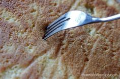 a fork sticking out of the top of a cake