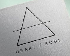 the logo for heart / soul is shown on top of a piece of white paper