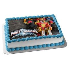 a birthday cake with an image of the character power rangers on it