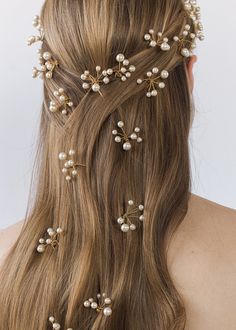 The Primavera Hair Pins were inspired by the ethereal essence of a Botticelli painting. Each pin in this set of three is comprised of numerous Swarovski pearls, which are meticulously strung by hand in our Brooklyn studio, creating a diaphanous spray of pearls with the illusion they're floating in midair. Consider pairing with the matching Primavera Circlet, or mixing with the Perla Bobby Pins. Packaging Dimensions: 6.5 x 6.5 x 1.75 inches Weight: Pearl Pins In Hair, Pins Packaging, Pearls In Hair, Rose Knight, Hair Pearls, Bridesmaid Hair Inspo, Pearl Hair Pin, Pearl Hair Pin Wedding, Ethereal Essence