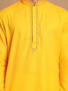 VASTRAMAY Men's Yellow Cotton Blend Kurta with Patiala Set Experience comfort and style with this vibrant yellow kurta set from VASTRAMAY. Made from a soft cotton blend, this set includes a kurta with a mandarin collar and full sleeves, paired with a Patiala salwar for a traditional look. Features: Comfortable cotton blend fabric Mandarin collar and full sleeves Patiala salwar for a traditional look Available in vibrant yellow color Specifications: Brand: VASTRAMAY Color: Yellow Material: Cotton Festive Yellow Kurta With Cutdana, Yellow Traditional Wear With Cutdana And Long Sleeves, Long Sleeve Yellow Kurta With Cutdana, Yellow Long Sleeve Kurta With Cutdana, Traditional Fit Cotton Sherwani With Cutdana, Cotton Sherwani With Cutdana In Traditional Fit, Yellow Straight Kurta For Eid, Yellow Sherwani With Cutdana In Straight Kurta Style, Yellow Straight Kurta For Navratri