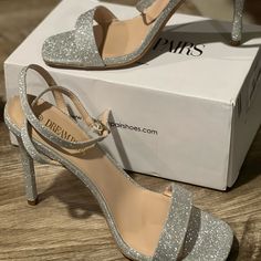 Beautiful New Silver Straps High Heel. Never Been Worn In The Box. 4 Inch Heel. Heels Glitter Silver, Silver Heels With Straps, Silver Heels Thick Heel, Black And Silver Heels Prom, Silver Dance Shoes, Glittery Silver Heels, High Heels Silver Shoes, Prom Silver Heels, Cute Silver Heels