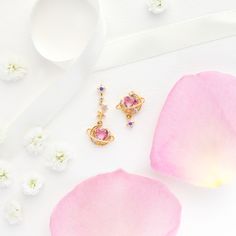 Our Lovesick Dangle Earrings are not for the faint of heart. These mismatched earrings pair perfectly together to give you a look that is out of this world! 18k gold plated, 18k rose gold plated, or rhodium plated over brass with a protective coating Cubic zirconia stones. Gradient stones may vary in hues of pink, purple and blue. Sterling silver posts and butterfly backings 2.5cm length Shop our entire Gradient Stones Collection here! Dope Jewelry, Mismatched Earrings, Necklace Chain Lengths, Stone Collection, Wrap Rings, Gold Earrings Dangle, Brass Pendant, Rose Gold Color, Ear Jewelry