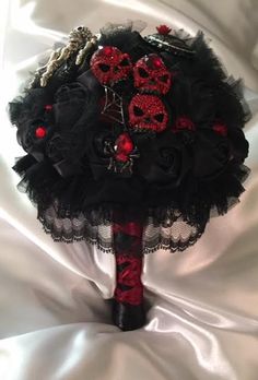 a black and red corsage with skulls on it