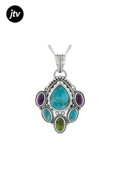 Introducing the stunning Multi-Color Composite Turquoise Sterling Silver Pendant With Chain by Southwest Style by JTV���. This exquisite piece features a mesmerizing combination of composite turquoise in shades of blue, green, and purple elegantly bound together to create a one-of-a-kind design. The pendant showcases pear-shaped and oval turquoise gemstones with varying lengths and widths for an eye-catching appeal.  Crafted from high-quality sterling silver, this pendant measures 1.62 inches in Blue Multi-stone Bohemian Turquoise Necklace, Bohemian Blue Multi-stone Turquoise Necklace, Elegant Green Teardrop Turquoise Necklace, Elegant Multi-stone Turquoise Necklace, Elegant Turquoise Multi-stone Necklaces, Elegant Turquoise Multi-stone Necklace, Elegant Multicolor Turquoise Necklace For Gift, Pendant With Chain, Southwest Style