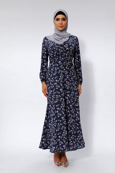 You'll find everything you're looking for, and more with the Blue Floral Maxi Dress! Breezy chiffon fabric, with a beautiful allover floral print, shapes this femme dress that has a criss cross neckline. A set-in waist tops a flowy maxi skirt. Elastic at the waist and sleeve for fit. Belt Included 100% Chiffon Criss cross Neckline Nursing Friendly Fit and Flare Elastic Waist and Cuff Cascading Ruffles at Hem Fully Lined Model is 5'10" wearing a size small Flowy Maxi Skirt, Blue Floral Maxi Dress, Flowy Maxi Skirts, Nursing Friendly, Floral Maxi, Chiffon Fabric, Floral Maxi Dress, Midnight Blue, Criss Cross