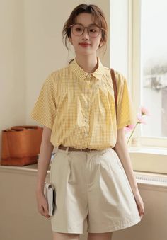 Boxy button up shirt with short sleeves and a picnic gingham print. S: 39" chest, 21" lengthM: 40.5" chest, 21" lengthL: 42" chest, 21.5" lengthXL: 43.5" chest, 21.5" length Preppy Summer Shirt With Buttons, Preppy Short Sleeve Shirt For Spring, Cotton Short Sleeve Blouse For Picnic, Summer Plaid Shirt With Buttons, Summer Plaid Shirt For A Day Out, Cotton Blouse With Short Sleeves For Picnic, Yellow Collared Short Sleeve Shirt For Spring, Gingham Short Sleeve Shirt For Summer, Preppy Collared Shirt For Summer