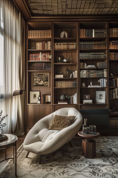 a living room filled with lots of bookshelves next to a couch and coffee table