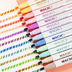 six markers are lined up on top of each other, with the words magic written in them