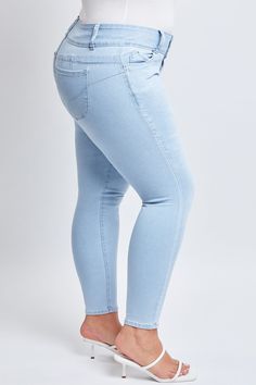 A favorite for a reason! Our Women’s Plus Mid-Rise WannaBettaButt 3-Button Skinny Jean features our signature heart shaped stitching and unique pocket shape that enhances your natural curves and gives your bum a lifted look. Featuring trendy detailing such as a 3-buttonfly and light distressing. Made in a mid-rise for a comfortable fit. Pair these with a light sweater and booties for an easy, chic look!Product Details- Mid-Rise- 3-Button Closure with Zipper- 5 Pocket Construction- Front DistressingSize & Fit (based on size 18)- Inseam: 29”- Rise: 11”- Leg Opening: 12”- Model is wearing a size 14Wash inside out.Machine wash cold.Tumble dry low.69% Cotton/ 26% Polyester/ 3% Other Fiber/ 2% Lycra Unique Pockets, Ymi Jeans, Jeans Store, Entrepreneur Fashion, Easy Chic, Midnight Sky, Fashion Bottoms, Natural Curves, Contemporary Outfits