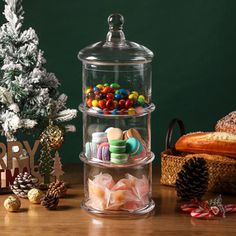 three tiered glass container filled with candy