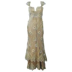 This Barraci gown is composed of a gold and yellow lace/silk combination which is embellished with rhinestones. There is a boned foundation, center back zipper closure, and corset style lace up back. In excellent vintage condition. **Please cross-reference measurements for personal accuracy. Measures (Approximately) Length: 53" Center Front 7" Train Bust: 34" Waist: 30" Hip: 37" Styling Lookbook, Evening Gowns Gold, Gold Lace Dress, Visenya Targaryen, Yellow Corset, Embellished Corset, Gold Lace Dresses, Dresses Yellow, Yellow Lace Dresses