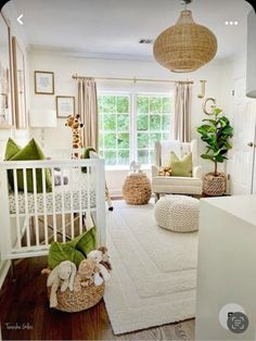 a baby's room is decorated in neutral colors