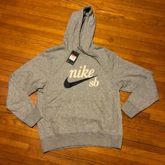 100% Authentic Brand New Sporty Logo Hoodie Top, Logo Hooded Top For Streetwear, Hooded Logo Top For Streetwear, Nike Athleisure Hoodie With Logo Print, Nike Sportswear Hoodie With Logo Print, Casual Athletic Heather Hoodie For Sports Season, Casual Athletic Heather Hoodie For College, Casual College Hoodie In Athletic Heather, Nike Sporty Hoodie With Logo Print