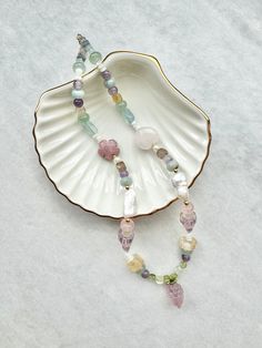 This unique necklace is one of a kind!  It features baroque pearls and stones such as * amethyst * amertine * aquamarine * prehnite * fluorite * labradorite * rhodonite & rose quartz and it's finished with a fluorite grape charm and gold vermeil findings Necklace length approximately - 17" /43cm Keep away from water. Avoid direct contact with perfumes and chemicals. Remove before showering or swimming. Bohemian Pastel Necklaces For Gifts, Bohemian Pastel Necklaces Gift, Rainbow Beaded Necklace, Jewelry Mood Board, Rose Quartz Jewelry, Handmade Jewelry Tutorials, Quartz Jewelry, Rainbow Beads, Necklace Pearl