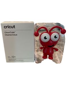 a small red figure next to a white box with the word circuit printed on it