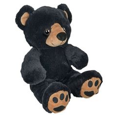 a black and brown teddy bear sitting up