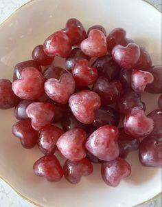 grapes in a white bowl with hearts shaped on the top and bottom, ready to be eaten