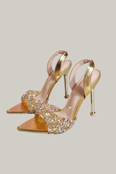 Elevate your style with our High-Heeled Pointed-Toe Metallic Rhinestone Sandals. These glamorous shoes feature intricate rhinestone details and an open toe design, perfect for showing off your pedicure. With a sleek stiletto heel and an ankle strap for added support, these sandals are both fashionable and functional. Made with high-quality materials such as PU leather lining and insole, as well as a durable PVC outsole, these sandals are sure to make a statement and elevate any outfit. In a beau Crazy Heels, Bandage Jumpsuits, Pretty Sandals, Rhinestone Sandals, Gold Heels, Leather High Heels, Toe Designs, Designer Heels, Shoe Lover