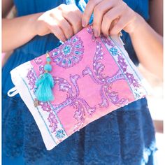 A small zipper pouch with embroidered details perfect for organzing Small Zipper Pouch, Summer Style Guide, Straw Bags, Embroidered Details, Red Blue Green, Pajama Bottoms, Heart Bracelet, Mommy And Me, Zipper Pouch