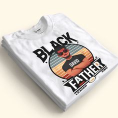 This Father's Day, give Dad the gift he really wants: a shirt that says "Black Father - Black Leader - Black King" on the front. Whether he's raising his own kids or just a lover of black culture and proud fatherhood, this shirt will let him know he's doing a good jobƒ??and one that he'll wear to remind himself of how much he means to you.This personalized Father's Day shirt also makes for an excellent birthday gift for Dad! Surprise your husband with this funny Father's Day t-shirt, or get it f Surprise Your Husband, Engraved Whiskey Glass, Memorial Benches, Black Leaders, Mom Daughter Gifts, Birthday Gift For Dad, Canvas Beach Bag, Leather Flask, Black Fathers