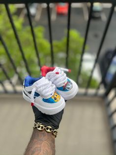 Custom Paw Patrol Themed Af1s. This price includes purchasing the sneakers as well as the custom work. All Toddler sizes are available. All prices are USD. Color Shade of shoe may vary on screen versus in person and under different lighting. All shoes are Made to Order and turnaround for completion is 4-6 weeks per shoe. Custom White Sneakers With Rubber Sole, Custom Multicolor Low-top Sneakers, Custom White Lace-up Sneakers, Custom Multicolor High-top Sneakers, Custom High-top Multicolor Sneakers, Customizable White Sneakers With Round Toe, Customizable Multicolor Streetwear Sneakers, Customizable White Round Toe Sneakers, Customizable Multicolor High-top Sneakers