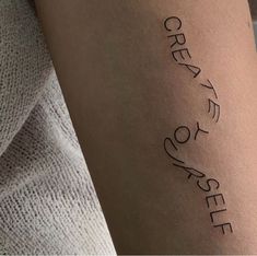 a woman's arm with writing on it that says, great to see yourself