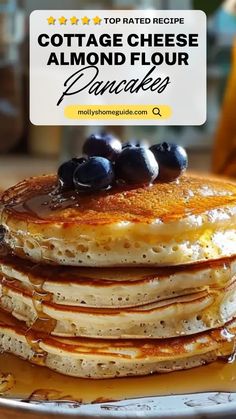 a stack of pancakes with blueberries on top and the words cottage cheese almond flour pancakes