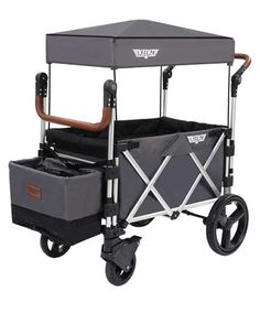 a gray wagon with two wheels and a canopy