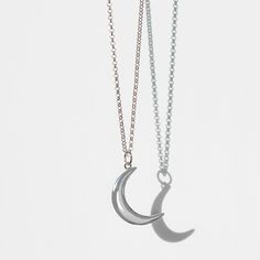 The silver moon necklace is the ultimate talisman for female empowerment and celebrates the inspirational women in our lives and throughout the world. 925 sterling silver & rhodium plate To keep your jewellery in peak condition, please polish with a micro-fibre cloth Spiritual Silver Crescent Necklace, Sterling Silver Celestial Pendant Charm Necklace, Celestial Moon Phase White Gold Necklace, Celestial White Gold Moon Phase Necklace, Silver Spiritual Jewelry With Moon Charm, Spiritual Silver Jewelry With Moon Charm, Silver Crescent Spiritual Jewelry, Spiritual Silver Crescent Jewelry, Sterling Silver Celestial Necklace With Polished Finish