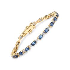 Liven up your look with a colorful collection of luscious jewels. This tennis bracelet trails the wrist with 5.03 ctw Genuine blue sapphire oval in 14k yellow gold with fine finish. An all-time favorite gemstones in an all-time classic silhouette. Box with tongue and safety clasp, 7.00 inches length blue sapphire tennis bracelet. Blue Oval Bracelet For Anniversary, Blue Oval Bracelets For Anniversary, Oval Jubilee Diamond Bracelet In 14k Gold, Blue Oval Diamond Bracelet For Anniversary, Oval Diamond Jubilee Bracelet In 14k Gold, 14k Gold Oval Diamond Jubilee Bracelet, Oval Yellow Gold Fine Jewelry Bracelet, Fine Jewelry 14k Gold Blue Bracelets, Formal Sapphire Tennis Bracelet In Yellow Gold