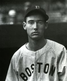 a black and white photo of a baseball player wearing a boston jersey with his name on it