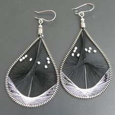 Silk thread earrings Beautiful and elegant black and white silk threads and tiny beads Lightweight earrings comfortable super fun to wear These chandelier earrings hang 3.5 inches long Lightweight and comfortable to wear great gift for her ------------------------------------------------ Boho Jewelry Earrings, Silk Earrings, Silk Thread Earrings, String Earrings, Dried Flower Jewelry, Dangle Earrings Boho, Silk Thread Jewelry, Tiny Beads, Earring Handmade