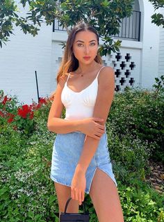 The Lola Mini Skirt Denim Short Skirt Poses, Skirt Poses, Mini Skirt Denim, Mini Skirt White, Mini Denim Skirt, Skirt Denim, Fleece Dress, Outerwear Outfit, Online Fashion Boutique