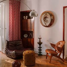 a living room filled with furniture and decor