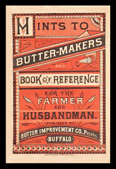 an old book with some type of lettering on the front and back cover, in red