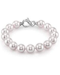 This beautiful Akoya pearl bracelet ranges between 9.5-10mm in size and consists of beautiful and lustrous pearls in AA+ quality. The option to upgrade to AAA quality pearls are available for an additional fee. All pearls in this bracelet are round and are strung with silk thread and double-knotted between each pearl. This bracelet comes standard with a beautiful 14K gold clasp, though premium clasps can be selected for an additional cost.
Known as the 'icon' of cultured pearls, Akoya pearls ha Luxury Akoya Pearl Bracelets With Pearl Drop, Luxury Classic Akoya Pearl Bracelet, Leather Pearl Jewelry, Pearl Trend, South Sea Pearl Necklace, Single Pearl Necklace, White Pearl Bracelet, Pearl Engagement Ring, Pearl Bracelets