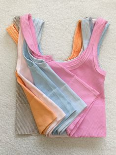 ☀Features: This Longer Length Everyday Tanktop offers a comfortable and stretchy fit that is suitable for most body types. Its versatile design makes it perfect for everyday wear, providing the utmost comfort and flexibility for any activity. Say goodbye to tight and restrictive tanktops with this must-have addition to your wardrobe. ☀Details: Fabric: 92% Nylon / 8% Spandex Made in USA Cute Things To Get Off Shein, Summer Style Clothes, Beachy Tank Tops, Cute Cropped Tops, Pink Ribbed Tank Top, Preppy Clothes For School, Shopping Lists Clothes, Dream Clothes Summer, Outerbanks Aesthetic Outfits