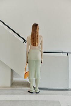 Elongated semi sheer ribbed knit leggings with a large elastic waist band. One size fits most 75% Rayon, 25% Nylon Dry clean only Sheer Beige Bottoms For Spring, Sheer Stretch Bottoms For Fall, Chic Sheer Bottoms For Fall, Knit Pencil Skirt, Knit Leggings, Knit Skirt, Waist Band, Knitting Yarn, Light Green