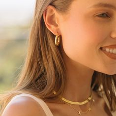 Our 14k gold-filled jewelry is bonded with 14k gold and is water and tarnish resistant. 14k gold-filled jewelry is a great alternative to solid gold, and can be worn by people with sensitive skin. - 14k gold-filled- Chain width: 5mm. - Chain length: 16 in + 2" extender- Waterproof, Tarnish resistant & Hypoallergenic Everyday Gold-tone Jewelry With Shiny Finish, Everyday Gold-tone Shiny Jewelry, Everyday Shiny Rose Gold Jewelry, Gold Tarnish-resistant Huggie Jewelry, Everyday Gold Plated Jewelry With Shiny Finish, Classic Gold-tone Hypoallergenic Jewelry, Everyday Yellow Gold Jewelry With Shiny Finish, Classic Cadmium-free Yellow Gold Jewelry, Everyday Gold Jewelry With Shiny Finish