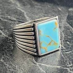 Handmade Square Turquoise Gemstone Silver Ring , Geometric Style Design Ring , Natural Blue Turquoise Ring , Men Vintage Ring , Gift For Him , Same Day For Shipping ✧ Product Details * Handmade İtem * Gender : Male / Female * Material : 925K Sterling Silver * Ring Weight : 11.5 Grams * Gemstone Type : Turquoise ✔ Usage Details * Silver jewelry is very sensitive to chemicals. It is recommended to keep away from chemical substances such as cream, bleach, deodorant, detergent. * Silver jewelry can Handmade Turquoise Rectangular Rings, Unique Rectangular Turquoise Ring, Modern Blue Rings With Large Stone, Rectangular Blue Turquoise Gemstone Ring, Modern Blue Turquoise Gemstone Ring, Modern Turquoise Ring As Gift, Modern Turquoise Ring For Gift, Modern Turquoise Ring For A Gift, Handmade Rectangular Blue Ring